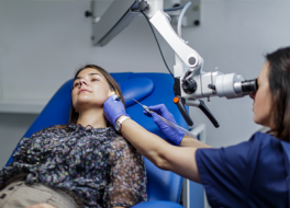 ENT nurse carrying out wax removal by microsuction